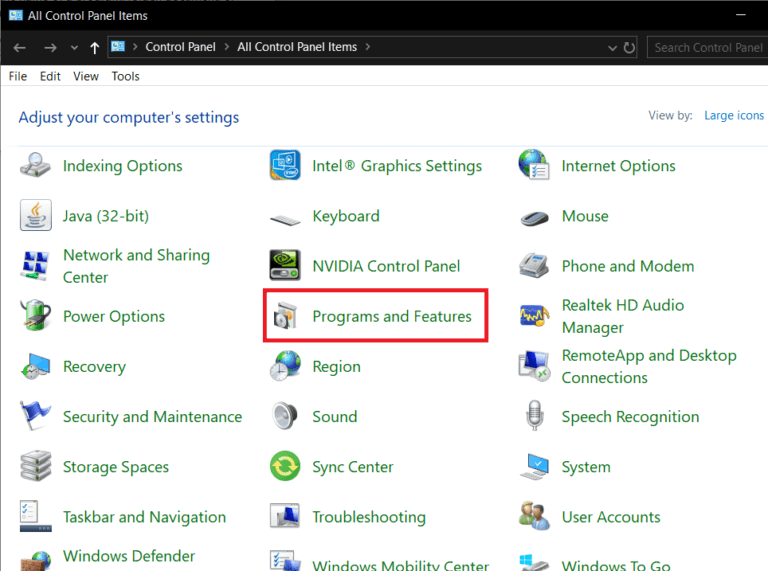 In-the-Control-Panel-window-click-on-Programs-Features-768x571-1 إصلاح خطأ برامج Adobe التي تستخدمها غير أصلية
