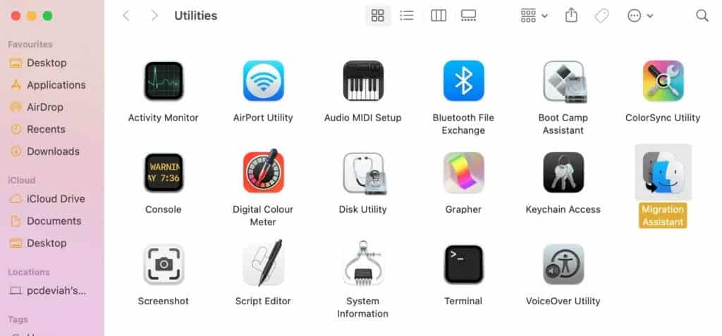 Click-on-Migration-Assistant-1024x477-1 كيفية استخدام مجلد الأدوات المساعدة على Mac