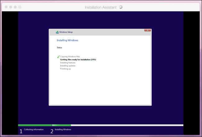 win11_intallation_in_progress-650x442 كيفية تشغيل Windows 11 على Intel أو M1 Mac