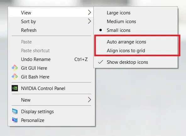 uncheck-auto-arrange-icon-and-align-icons-to-grid-592x435 كيفية إصلاح الأيقونات على سطح المكتب