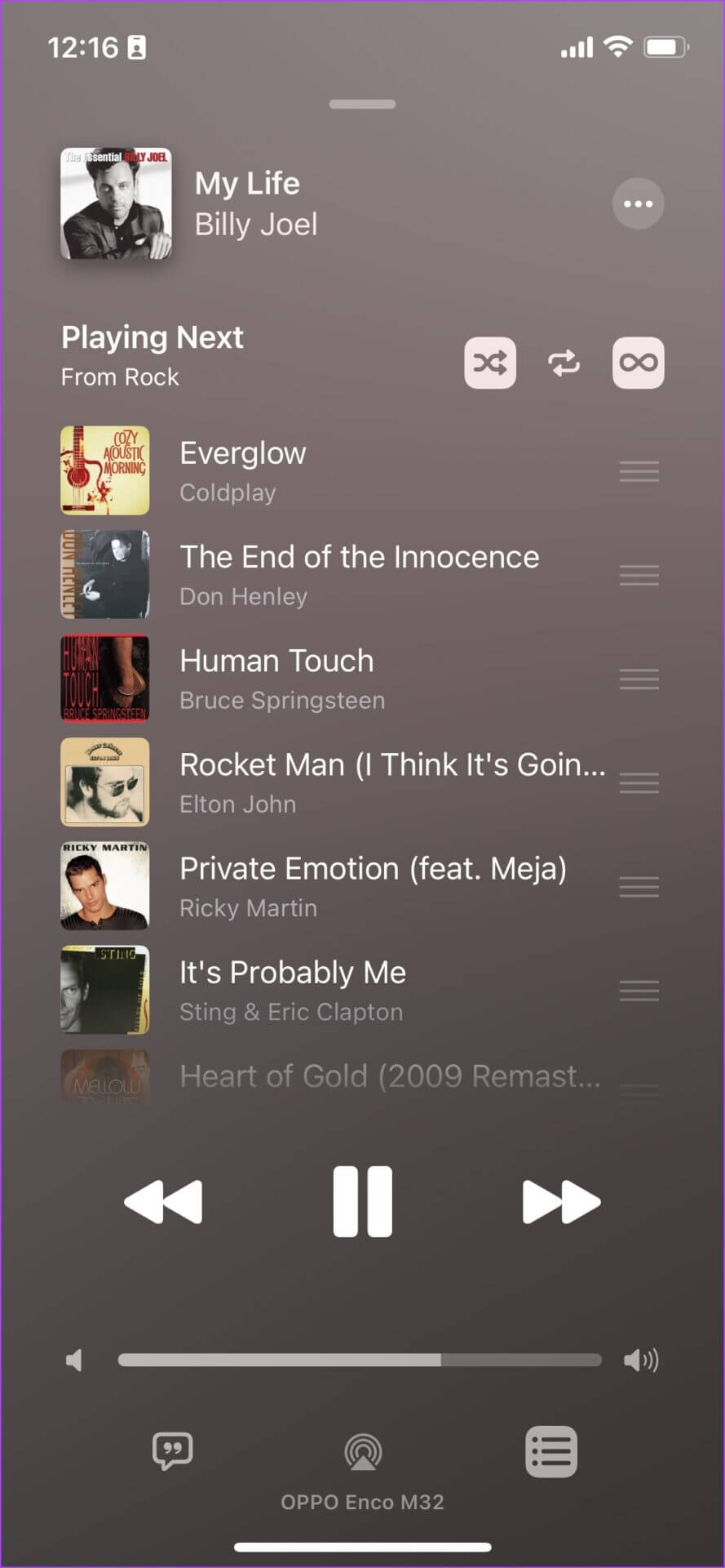 Apple-Music-Queue-1-889x1920 مقارنة Apple Music مقابل Spotify: ما هو تطبيق بث الموسيقى الذي سيتم استخدامه في 2025