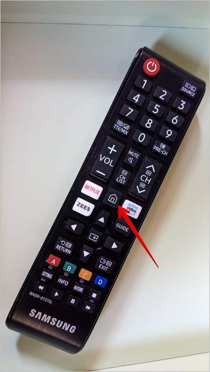 Samsung-Remote-Home-Button-724x1284 كيفية إضافة التطبيقات وإزالتها وإدارتها على Samsung Smart TV