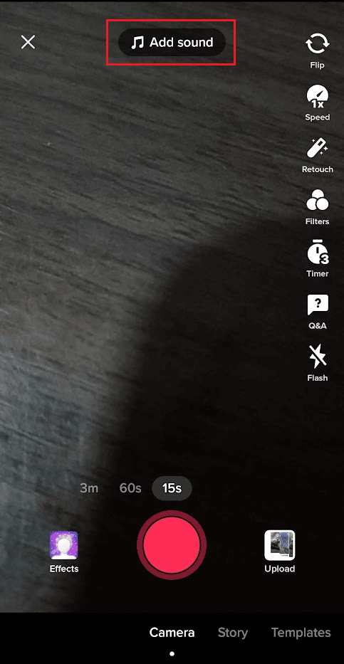 Tap-on-the-Add-sound-option-from-the-top-of-the-camera-screen كيفية قص الصوت على TikTok