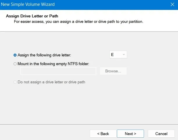 Format-USB-Windows-Disk-Management-Wizard-Assign-Letter.jpg كيفية تهيئة محرك أقراص USB في Windows