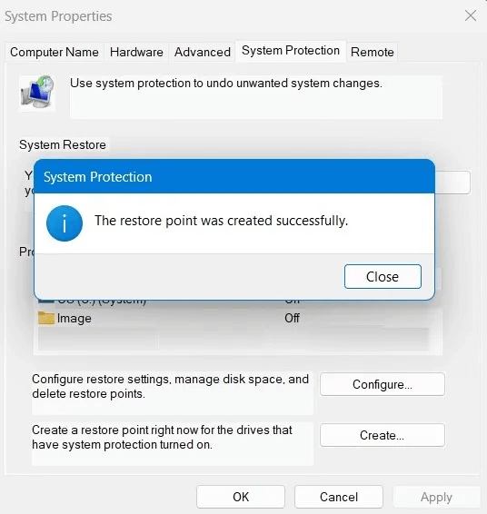 Registry-Backup-Restore-Successful-Creation-of-Restore-Point.jpg كيفية عمل نسخة احتياطية من سجل Windows واستعادته