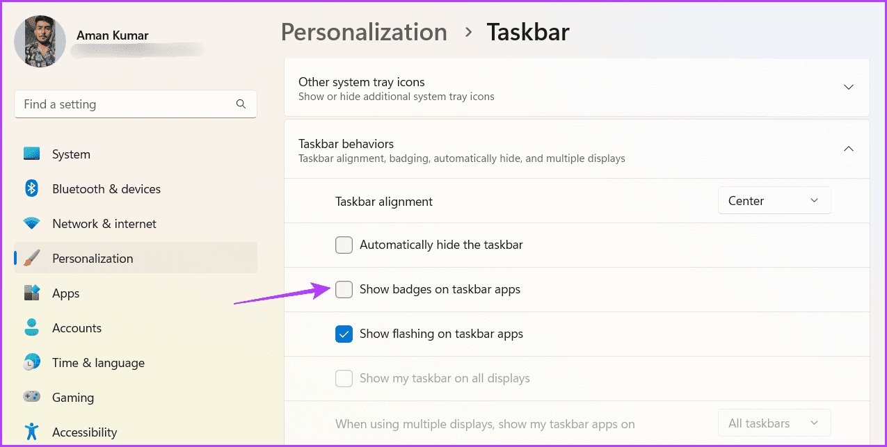 Show-badges-on-the-taskbar-apps أفضل 6 طرق لإصلاح عدم عمل ميزة اختفاء شريط المهام التلقائي في Windows 11