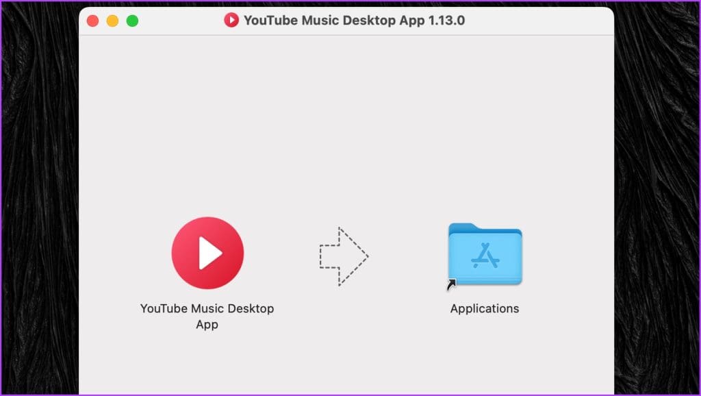drag-the-YouTube-Music-app-to-the-Applications-folder-to-install-it-1024x578-1 كيفية تثبيت تطبيق YouTube Music على سطح المكتب (Windows وMac)