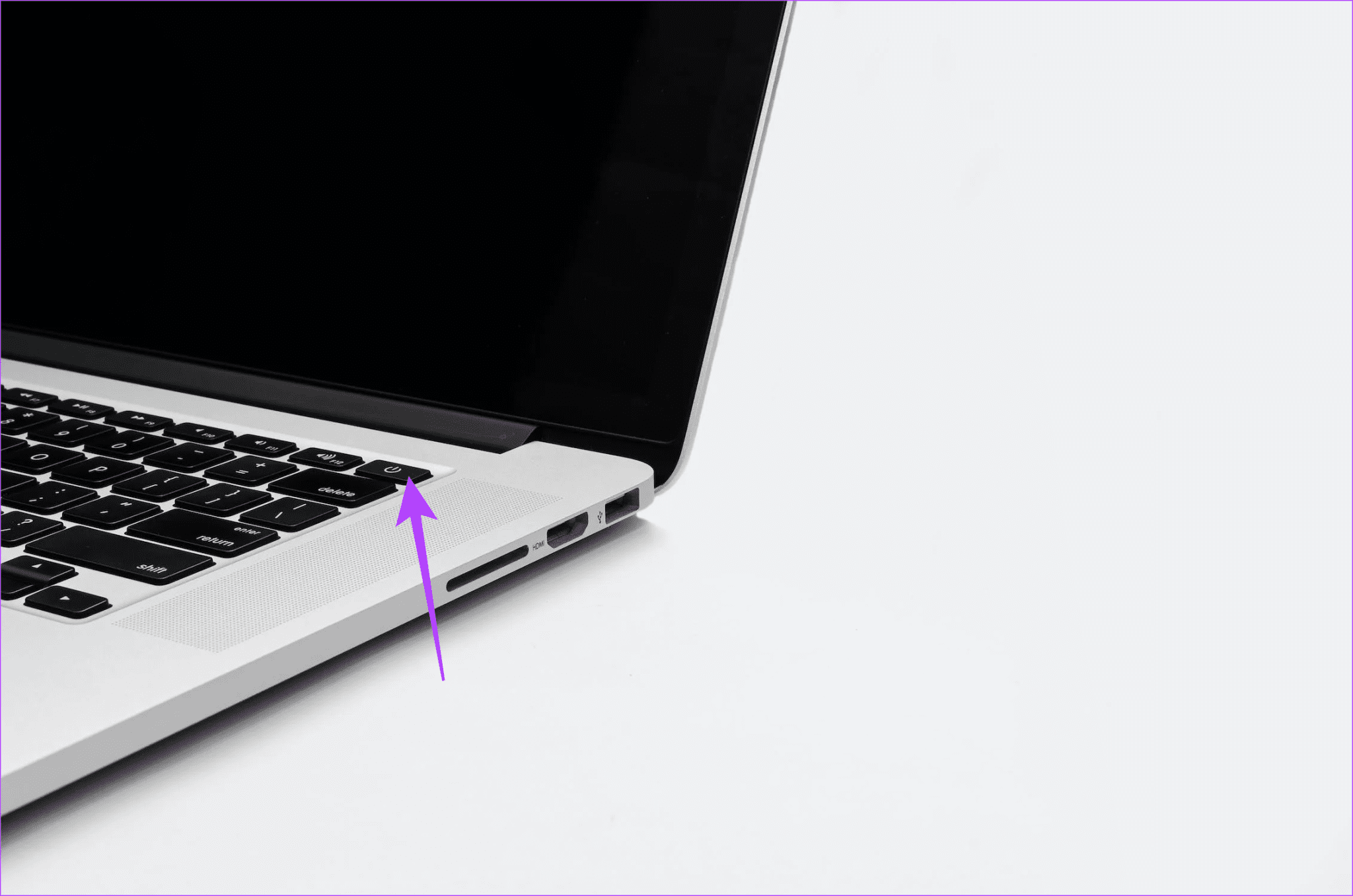 Press-Hold-Power-Button-2048x1356-1 لماذا لا يمكنني تحديث جهاز MacBook وكيفية إصلاحه