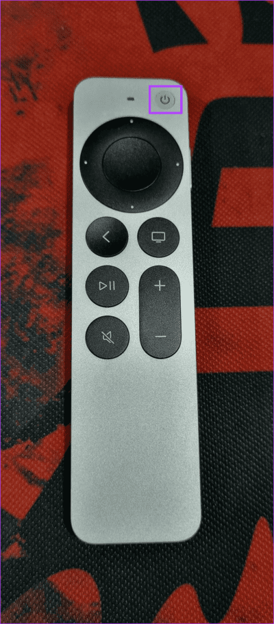 Press-power-button كيفية إيقاف تشغيل Apple TV باستخدام جهاز التحكم عن بعد أو بدونه