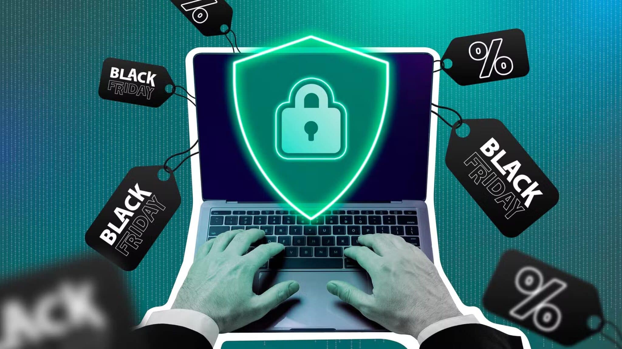 a-hand-using-a-laptop-with-a-shield-in-the-center-and-several-black-friday-tags-around-it-scaled أهم النصائح لحماية بياناتك أثناء تسوق الجمعة السوداء