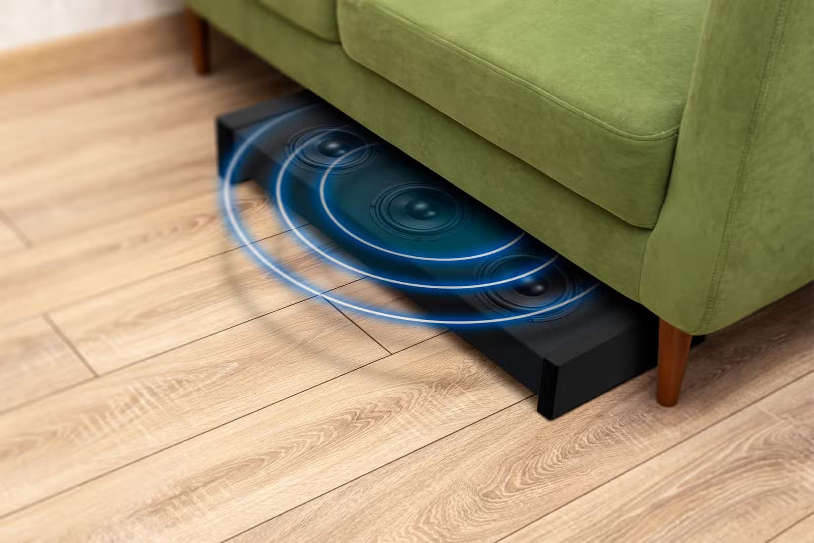 a-subwoofer-under-a-couch 10 مصطلحات أساسية في الصوت يجب على كل مبتدئ معرفتها