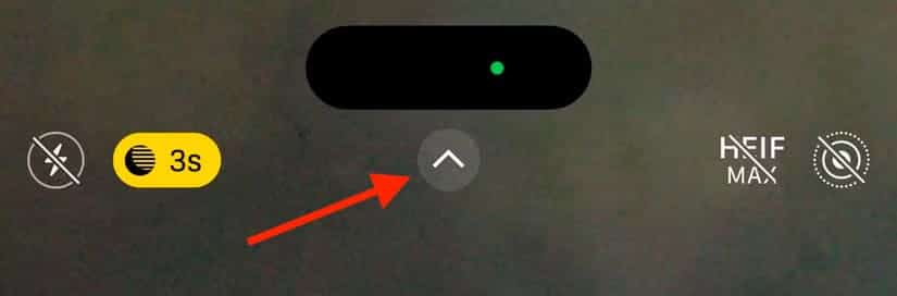 arrow-icon-in-camera-app-on-iphone طريقة التقاط صور بتعرض طويل على iPhone بخطوات بسيطة