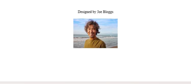 the-words-designed-by-joe-bloggs-and-a-picture-of-a-man-at-the-bottom-of-the-page-in-microsoft-word-that-will-form-the-back-of-the-christmas-card خطوات تصميم بطاقة عيد مميزة باستخدام Microsoft Word