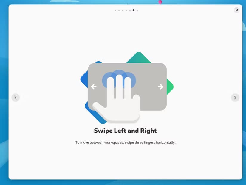 3-gnome-tour-app-showing-how-to-switch-virtual-desktops-with-touchpad-guestures الفرق بين GNOME وKDE Plasma واختيار الأفضل بينهما لأجهزة سطح المكتب بنظام Linux