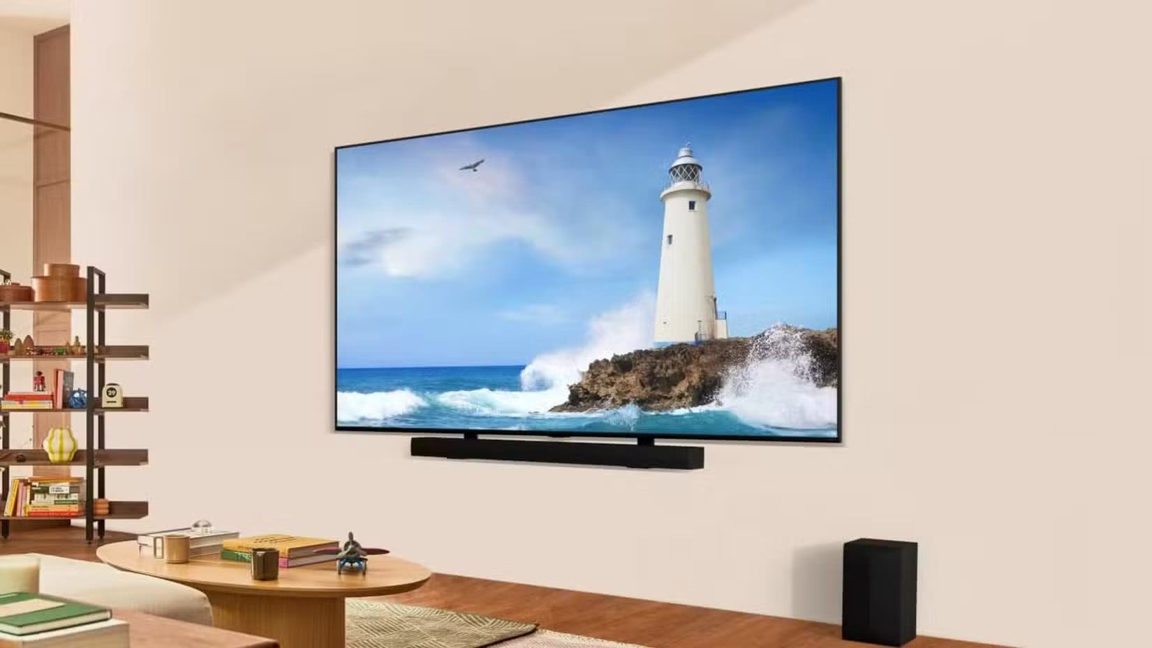 lg-55-inch-class-qned85t-series-led-smart-tv-4k-processor-flat-screen-mounted-on-a-wall-showing-an-image-of-a-lighthouse-surrounded-by-the-sea أشياء يجب معرفتها قبل شراء تلفزيون جديد