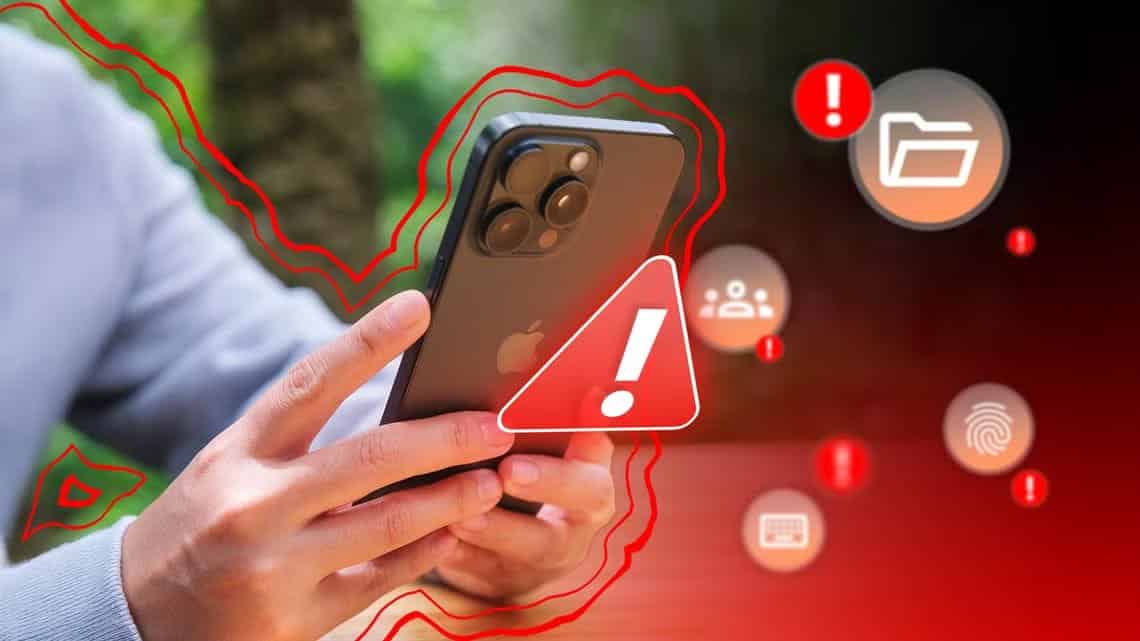 a-person-holding-an-iphone-with-a-warning-sign-and-several-icons-around-it 9 مشاكل في iPhone يلاحظها المستخدمون بعد تحديث iOS 26