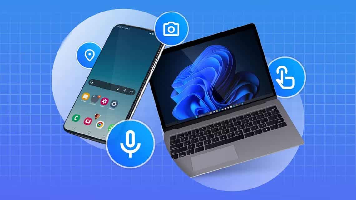 a_smartphone_next_to_a_laptop_with_some_icons_around_them 7 استخدامات يومية للهاتف تغنيك عن الكمبيوتر
