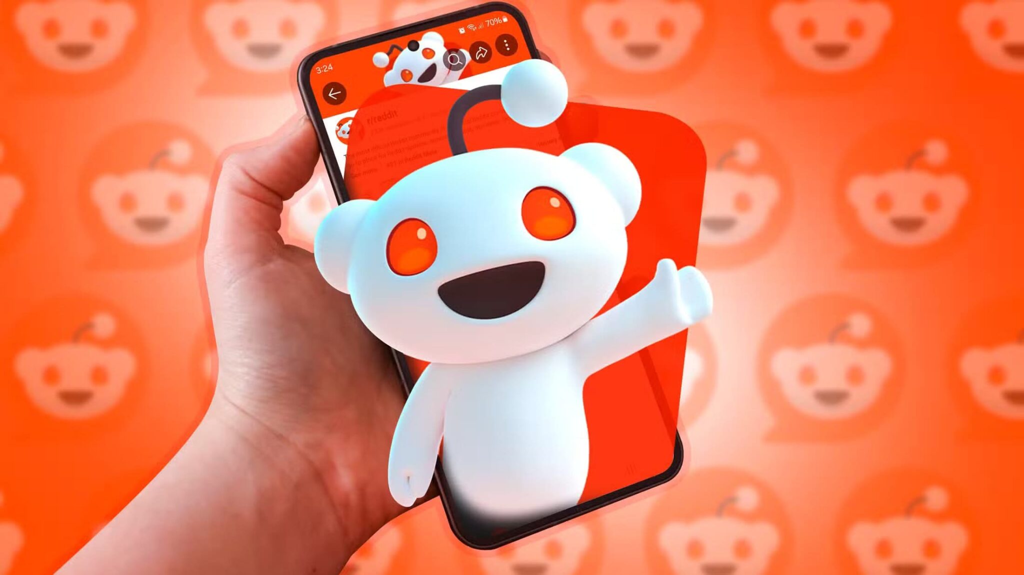 a-phone-with-the-reddit-mascot-coming-out-of-the-screen-scaled طريقة بسيطة لتخصيص موجز Reddit باستخدام برنامج نصي خفيف