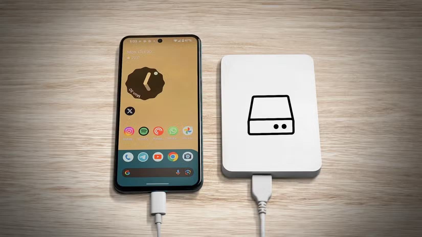 an-android-phone-on-the-left-with-android-home-screen-and-a-hard-drive-on-the-right-with-a-hdd-logo سلوكيات يومية تضعف أمان هاتفك Android بشكل كبير