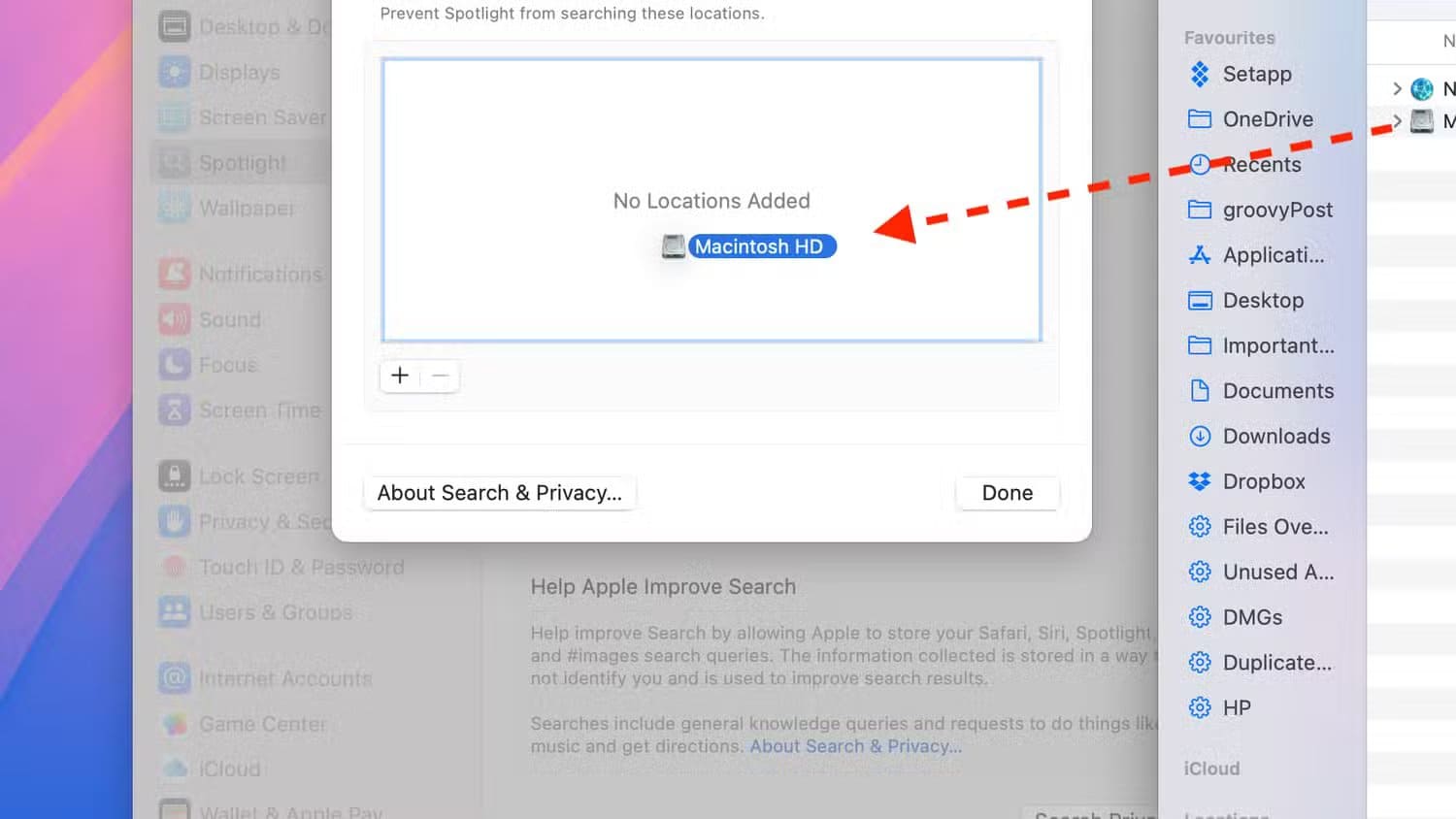 dragging-macintosh-hd-disk-into-privacy-window-in-spotlight-settings-on-mac حل مشكلة اختفاء التطبيقات من Spotlight في Mac