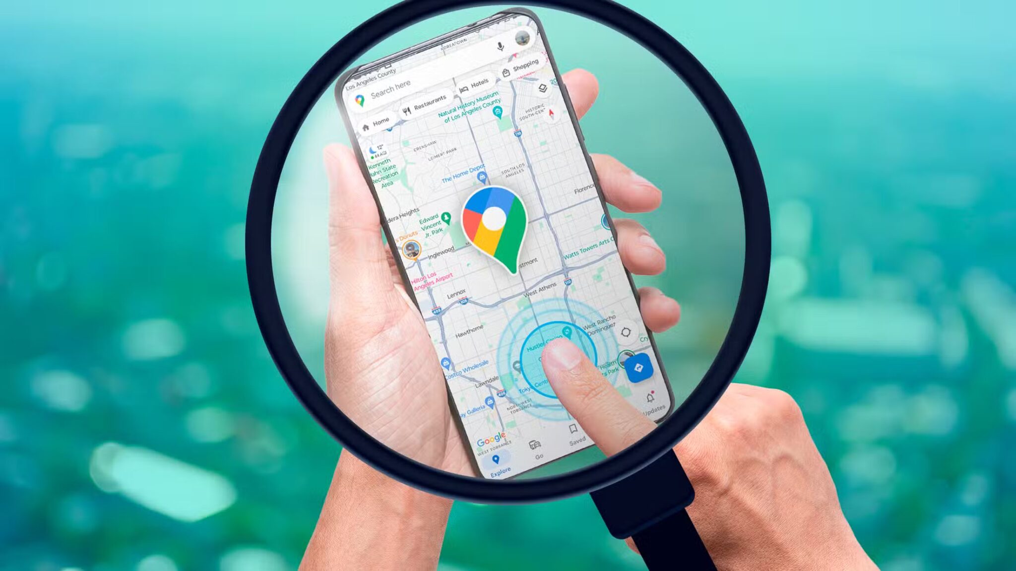 a-magnifying-glass-showing-a-smartphone-with-google-maps-open-and-a-person-s-finger-pointing-towards-the-screen-scaled أهم استخدامات Google Maps التي لا يعرفها الكثيرون غير الملاحة