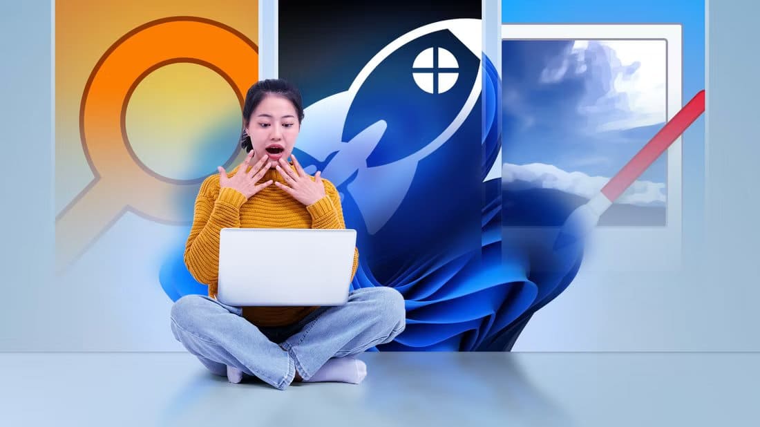 a-surprised-woman-sitting-on-the-floor-with-a-laptop-in-front-of-large-icons-of-everything-search-winhance-and-paint-net-over-a-windows-11-background 3 تطبيقات ويندوز غير معروفة ستجعل تجربتك أسرع وأسهل
