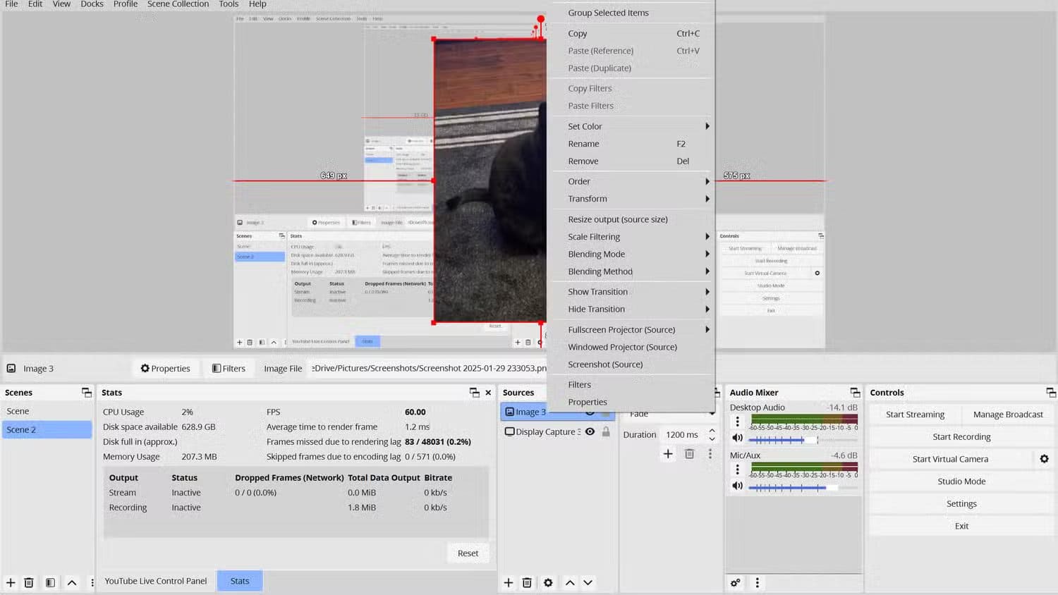 an-obs-project-of-a-black-cat-sitting-on-a-rug-the-source-the-image-of-the-cat-is-on-has-been-right-clicked-to-show-a-tool-menu-to-adjust-the-source-layer إعدادات OBS التي تجعل البث المباشر بجودة احترافية