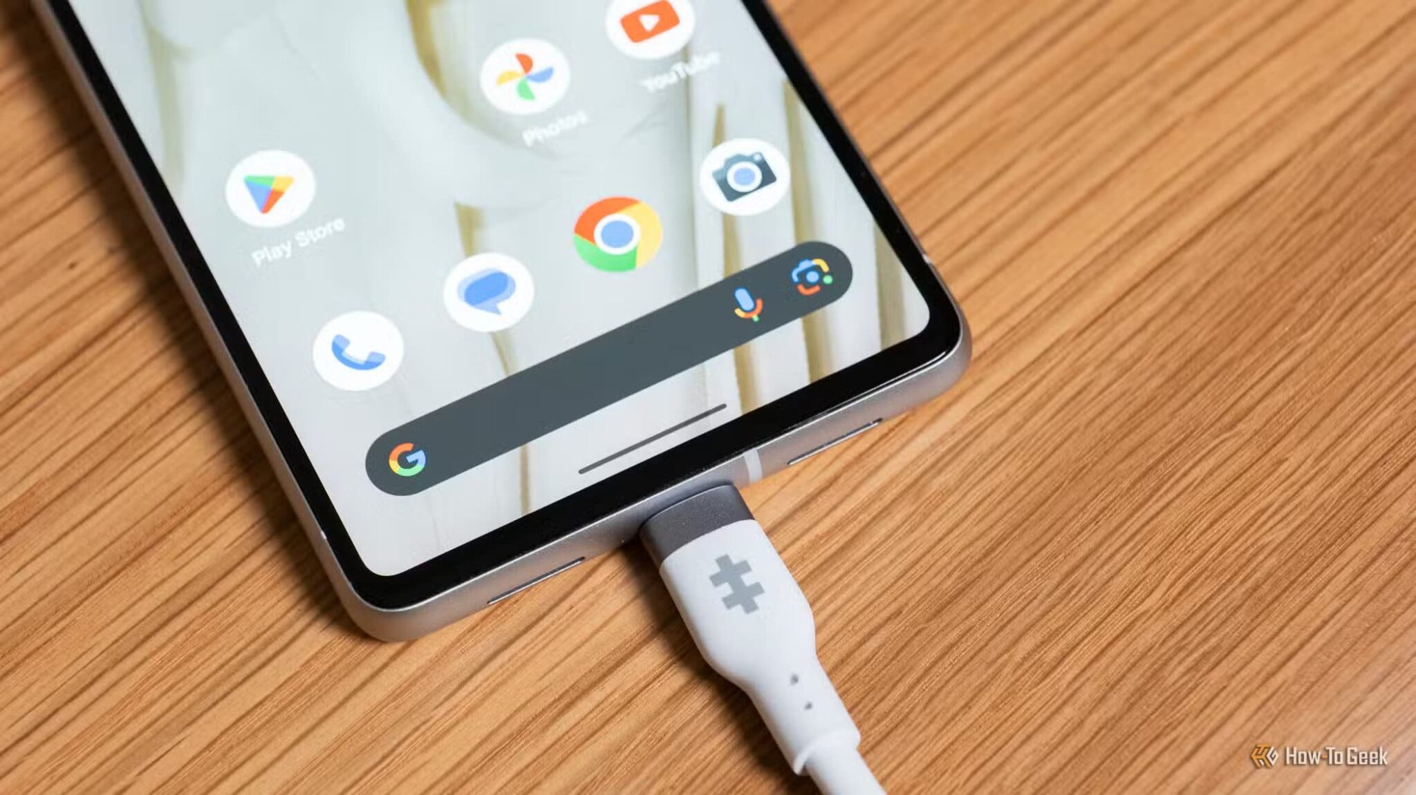 the-hyper-hyperjuice-240w-silicone-usb-c-to-usb-c-cable-plugged-in-a-phone-2_53656654509_o-scaled هل الشحن السريع يضر البطارية وما فوائده الحقيقية للهواتف