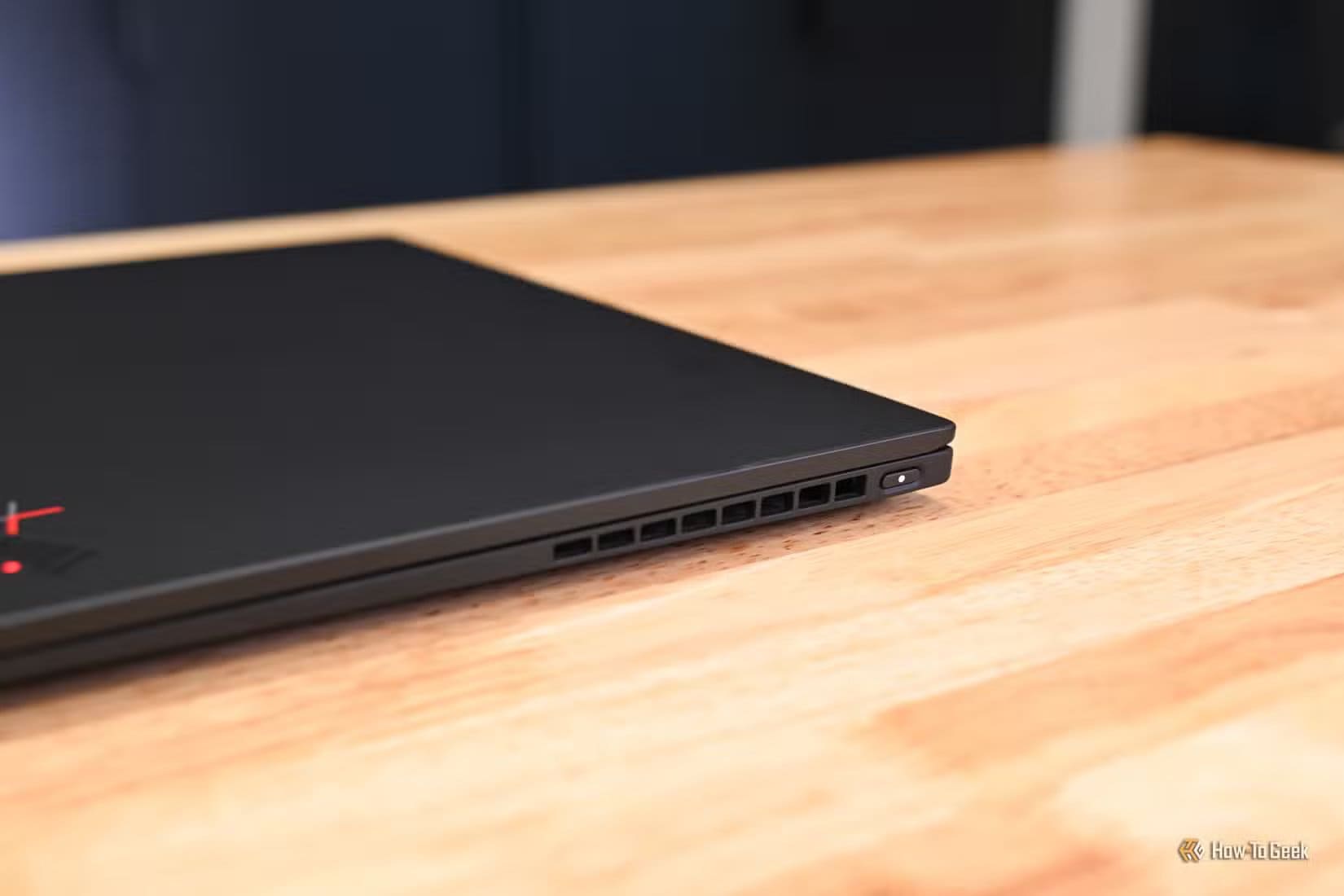 vent-and-power-button-on-the-lenovo-thinkpad-x1-nano-gen-3jpg_53068614071_o أسباب سخونة الكمبيوتر المحمول وطرق فعالة لتبريده بسهولة