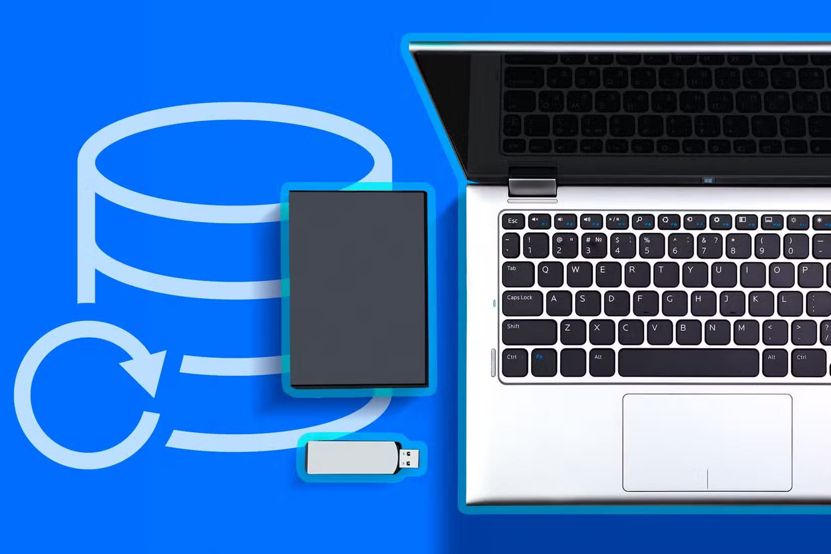 a-laptop-with-a-usb-drive-and-an-external-hard-drive-next-to-it-and-a-backup-icon كيفية الانتقال من Windows إلى ChromeOS خطوة بخطوة