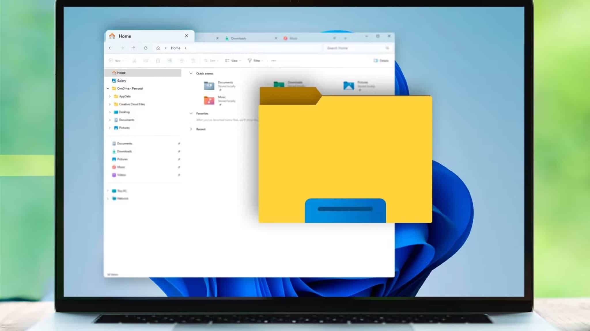 a-notebook-with-the-windows-11-file-explorer-open-and-the-file-explorer-icon-in-the-front-scaled أفضل أداة لنسخ الملفات الكبيرة على Windows دون أخطاء