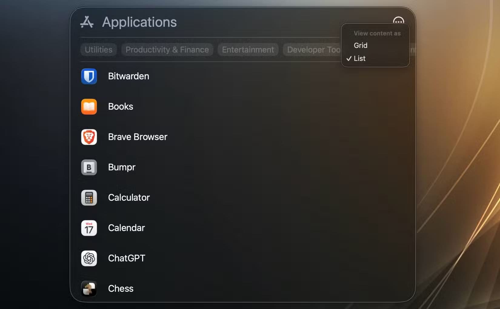 application-list-view-in-spotlight طرق استبدال لوحة التشغيل في macOS Tahoe بسهولة