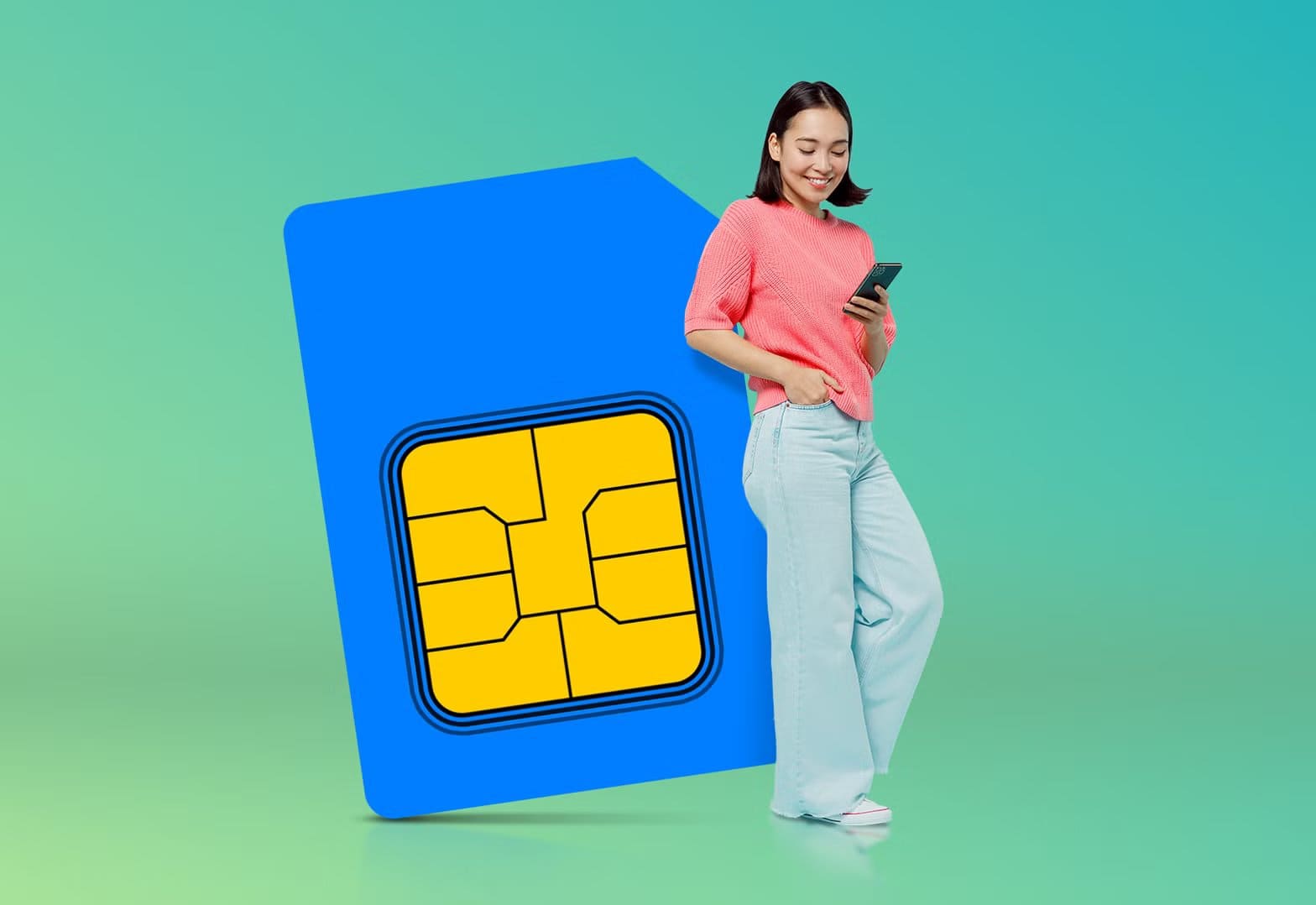 smiling_woman_using_a_smartphone_while_standing_next_to_an_oversized_sim_card_on_a_green_gradient_background الفرق بين eSIM والبطاقة SIM العادية وأيهما أنسب لك
