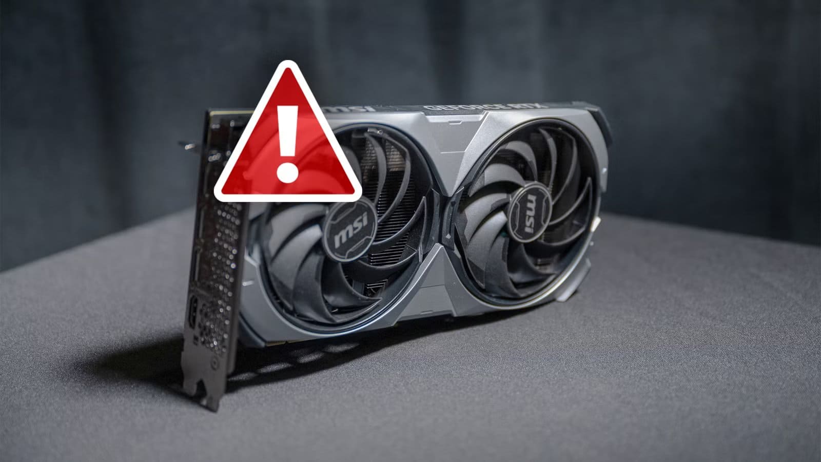 a-gpu-with-a-warning-icon لماذا ترتفع حرارة بطاقة الرسومات وما الذي يمكنك فعله حيال ذلك