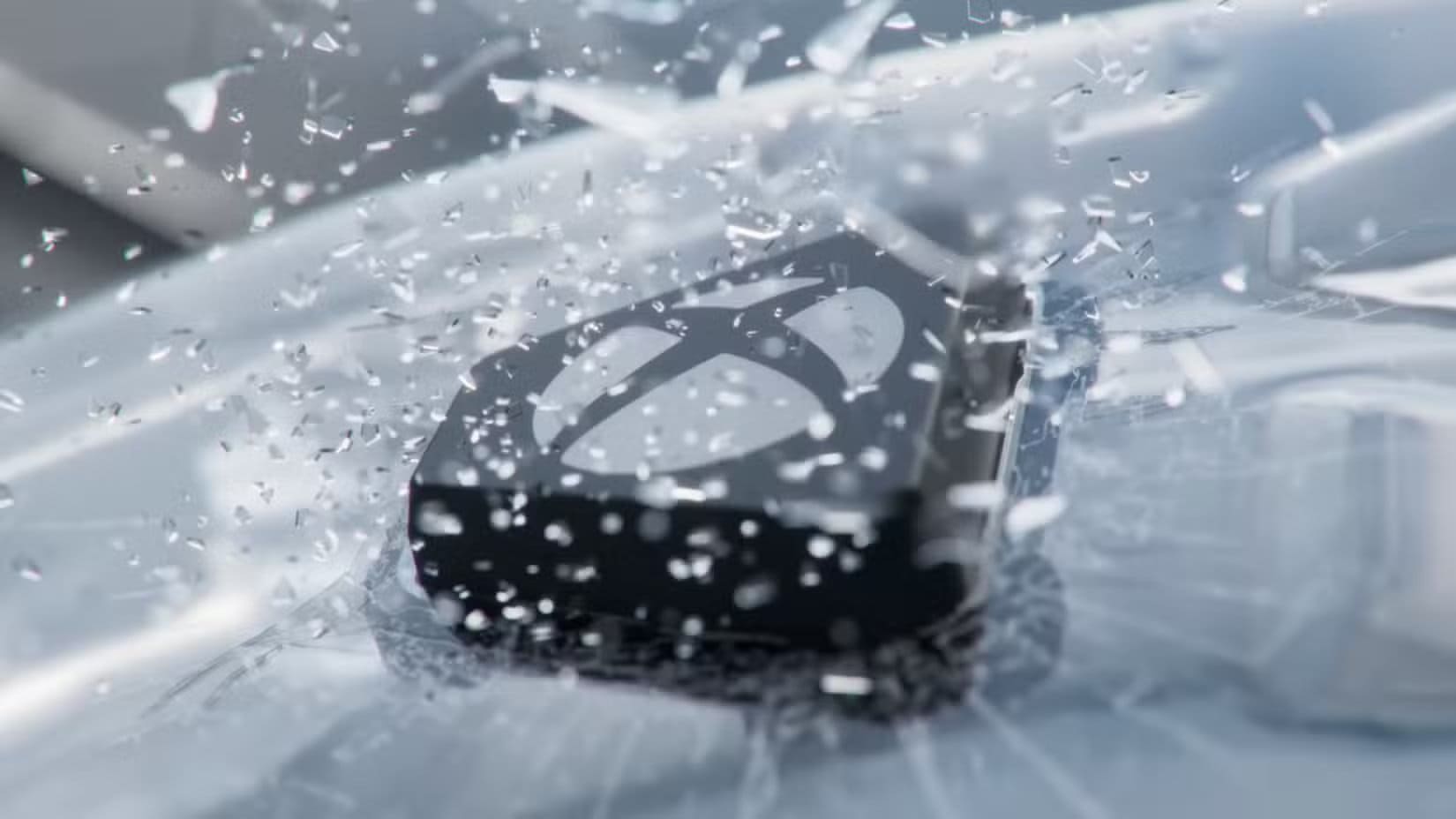 xbox-button-smashing-through-glass-in-the-rog-xbox-ally-reveal عشّاق Xbox انتبهوا إلى ROG Xbox Ally 2025 – هل هو ثورة أم تراجع؟