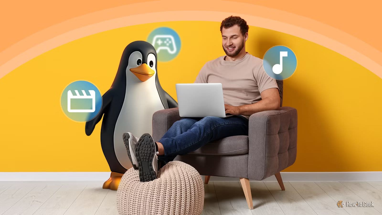 a-man-sitting-comfortably-on-an-armchair-using-a-laptop-with-the-linux-mascot-tux-standing-beside-him-and-floating-icons-representing-media-gaming-and-music أقوى الاستخدامات اليومية التي تُثبت قدرة Linux على إنجاز الأعمال بكفاءة عالية