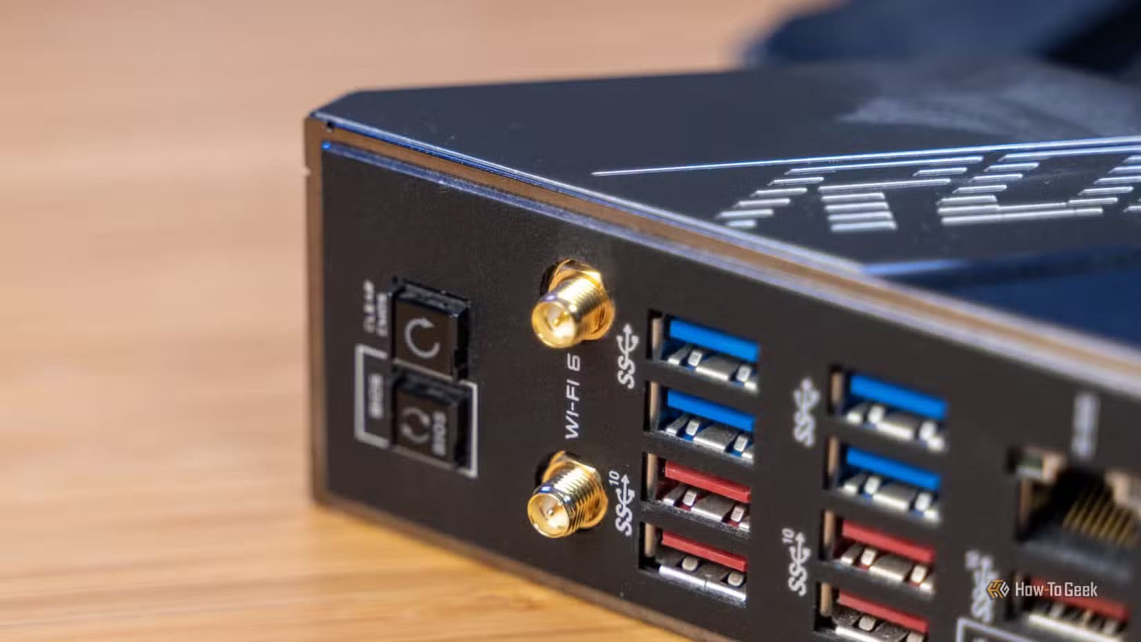 asus-rog-dark-hero-am4-motherboard-back-panel-io-wi-fi قطع حاسوب تبدو مهمة لكنها تهدر أموالك بدون أي فائدة حقيقية