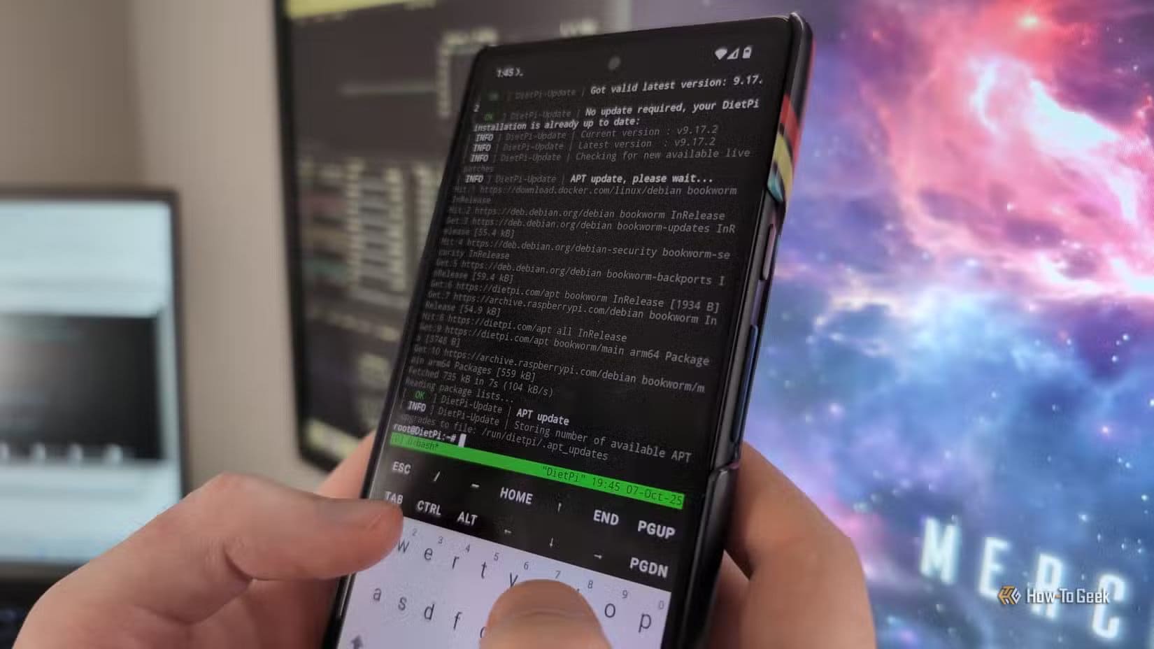 person-s-hands-holding-an-android-phone-with-the-termux-app-open-and-a-linux-terminal-visible تطبيقات Android مفتوحة المصدر تستحق الاستخدام حتى لو لم تكن مجانية