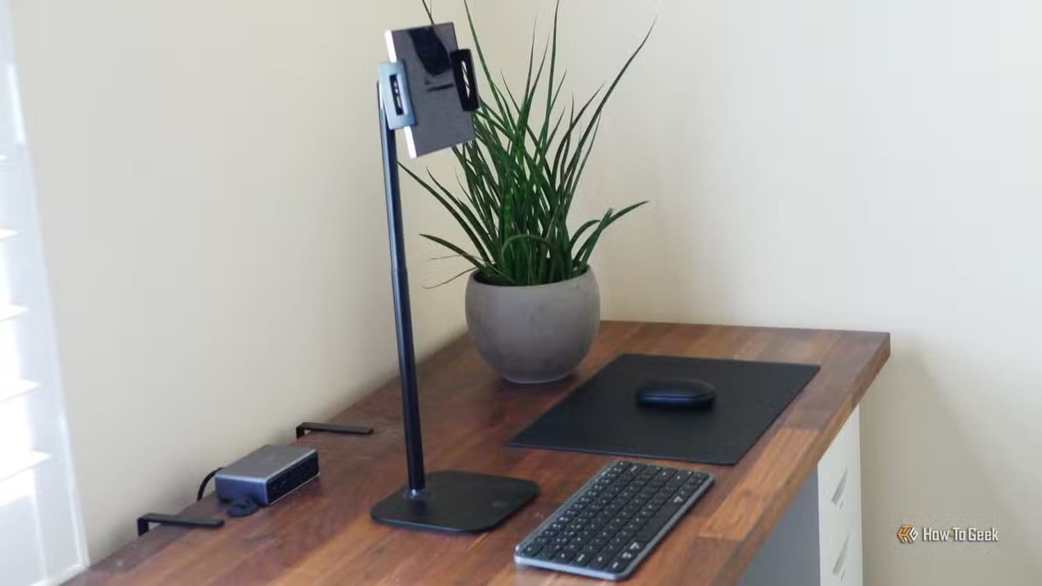 a-tall-phone-stand-holding-a-galaxy-z-fold-6 4 Reasons Why Many People Avoid Linux as Their Primary Operating System