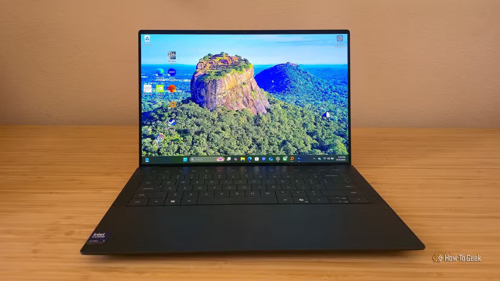 the-dell-14-premium-da14250-laptop-sitting-open-on-a-desk لماذا يكفيك Windows Defender لحماية جهازك دون شراء مضاد فيروسات مدفوع