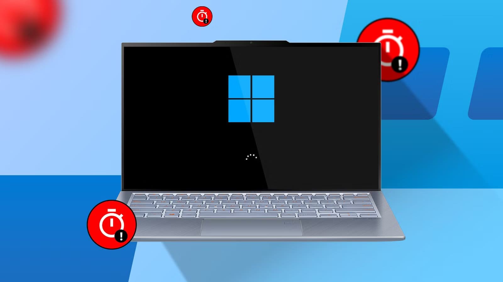 a-laptop-displaying-the-windows-11-boot-screen-with-a-loading-spinner-surrounded-by-red-alert-stopwatch-icons خمسة أخطاء قد تحدث عند إزالة البرامج المدمجة من ويندوز 11