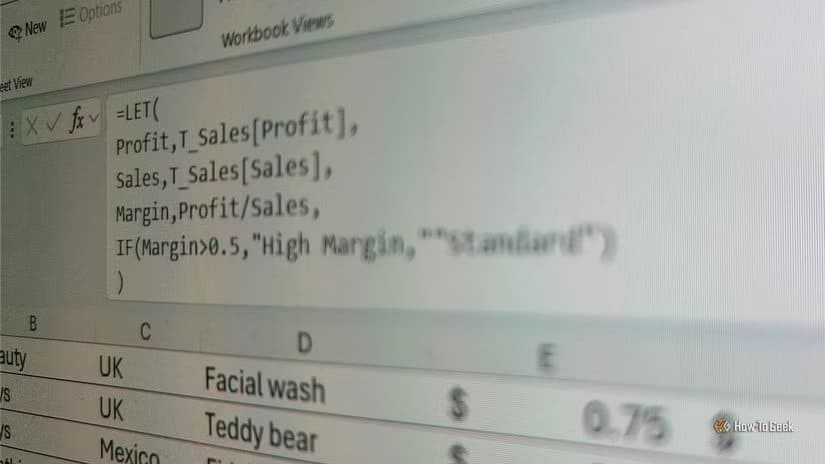 laptop-screen-showing-an-extended-formula-bar-in-excel-with-a-let-formula-typed-onto-multiple-lines 6 إعدادات في واجهة Excel يجب تعديلها لزيادة السرعة والدقة قبل إنشاء أي جدول