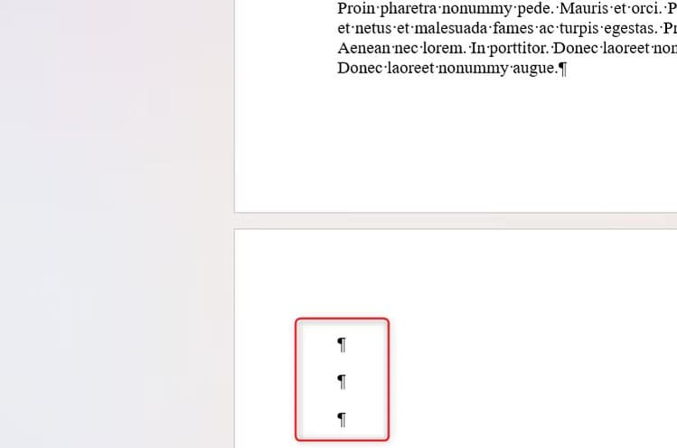 three-paragraph-markers-at-the-start-of-a-new-page-in-microsoft-word استخدام الأحرف غير القابلة للطباعة في Microsoft Word لتحسين تنسيق المستندات بدقة