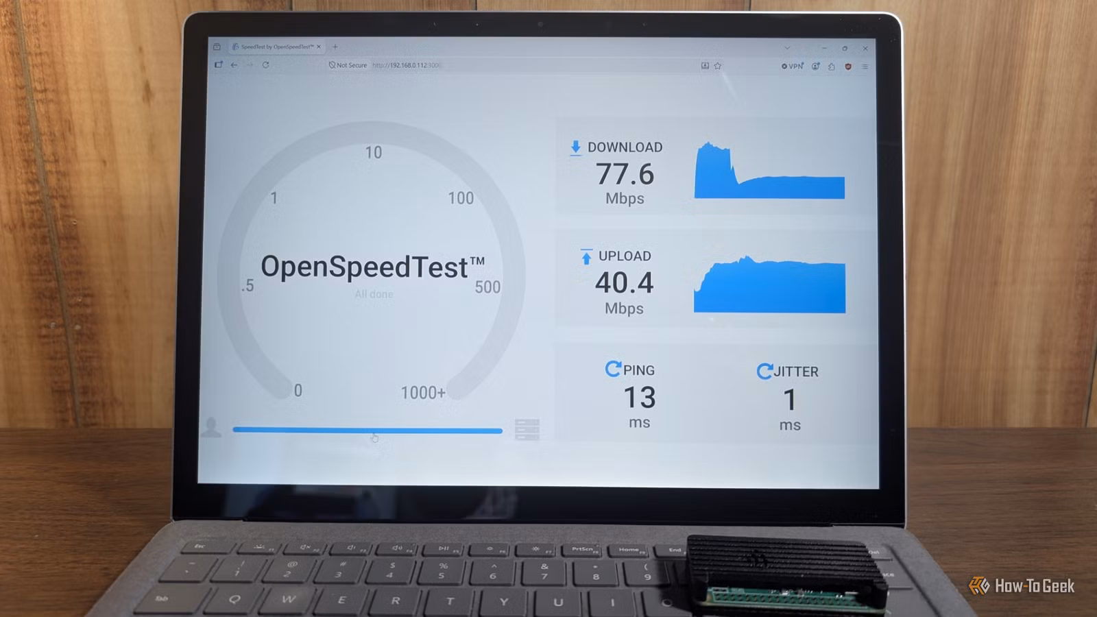 laptop-displaying-openspeedtest-results-network-speed-test لماذا لا يكشف اختبار سرعة الواي فاي المشكلة الحقيقية في شبكتك