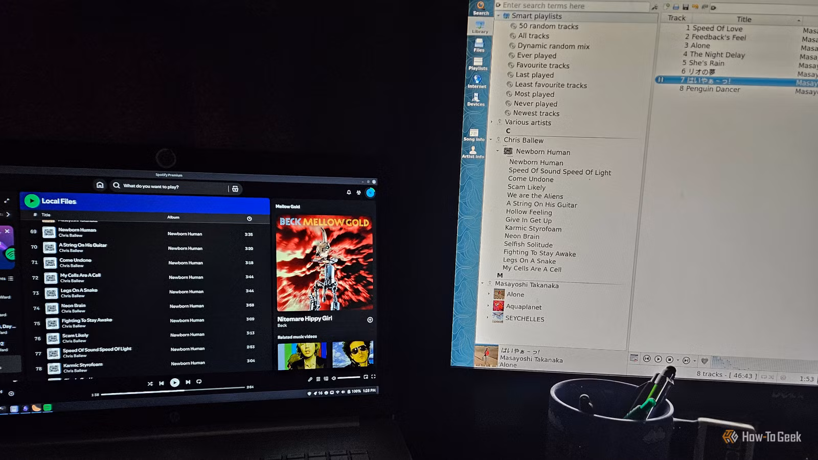 spotify-and-clementine-open-side-by-side-on-two-different-monitors أفضل مشغل موسيقى لنظام Linux كبديل لسبوتيفاي على سطح المكتب