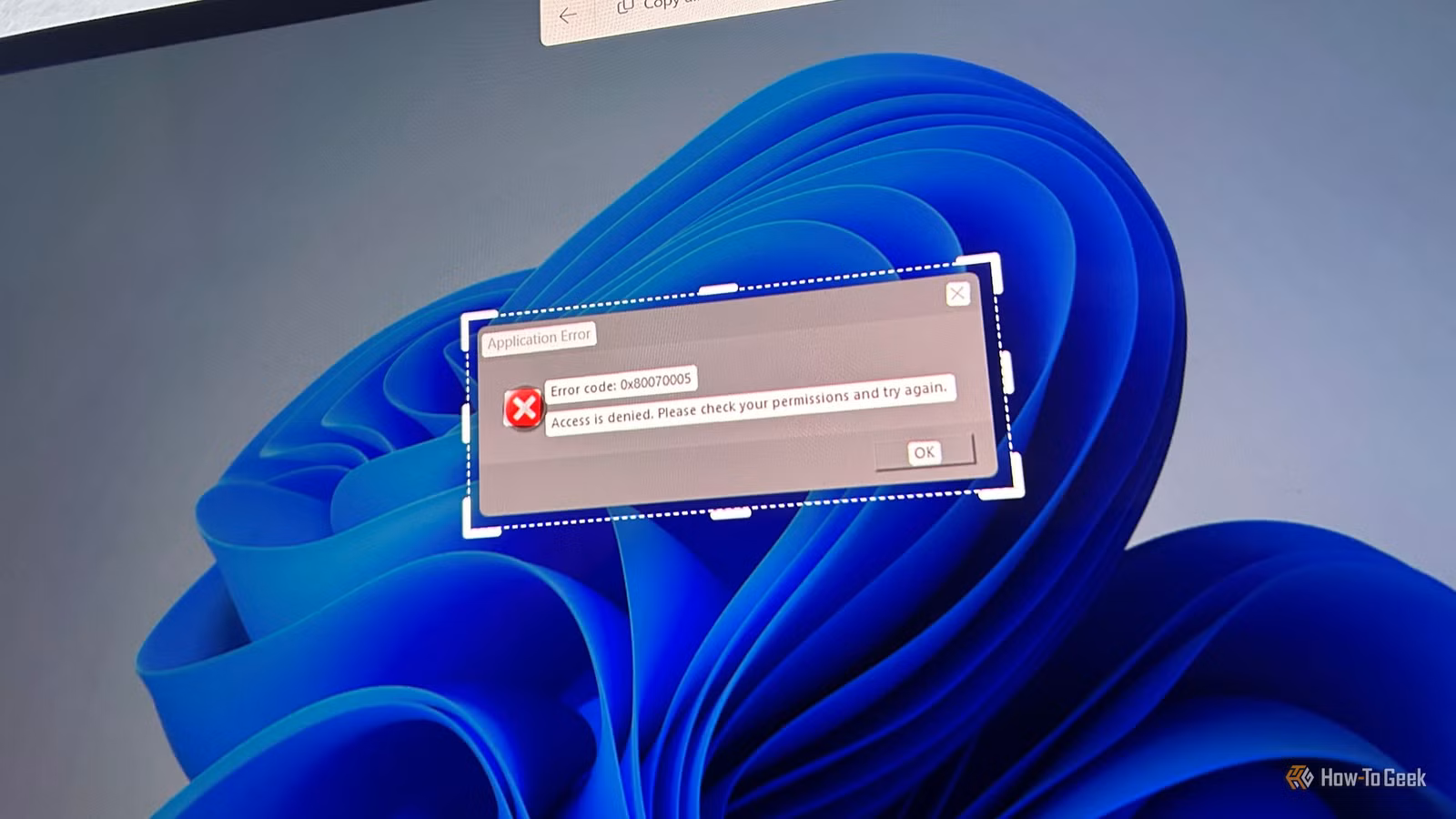 laptop-screen-snipping-tool-text-extractor-error-dialog حيلة بسيطة في ويندوز تتيح لك نسخ رسائل الخطأ ولصقها بسهولة